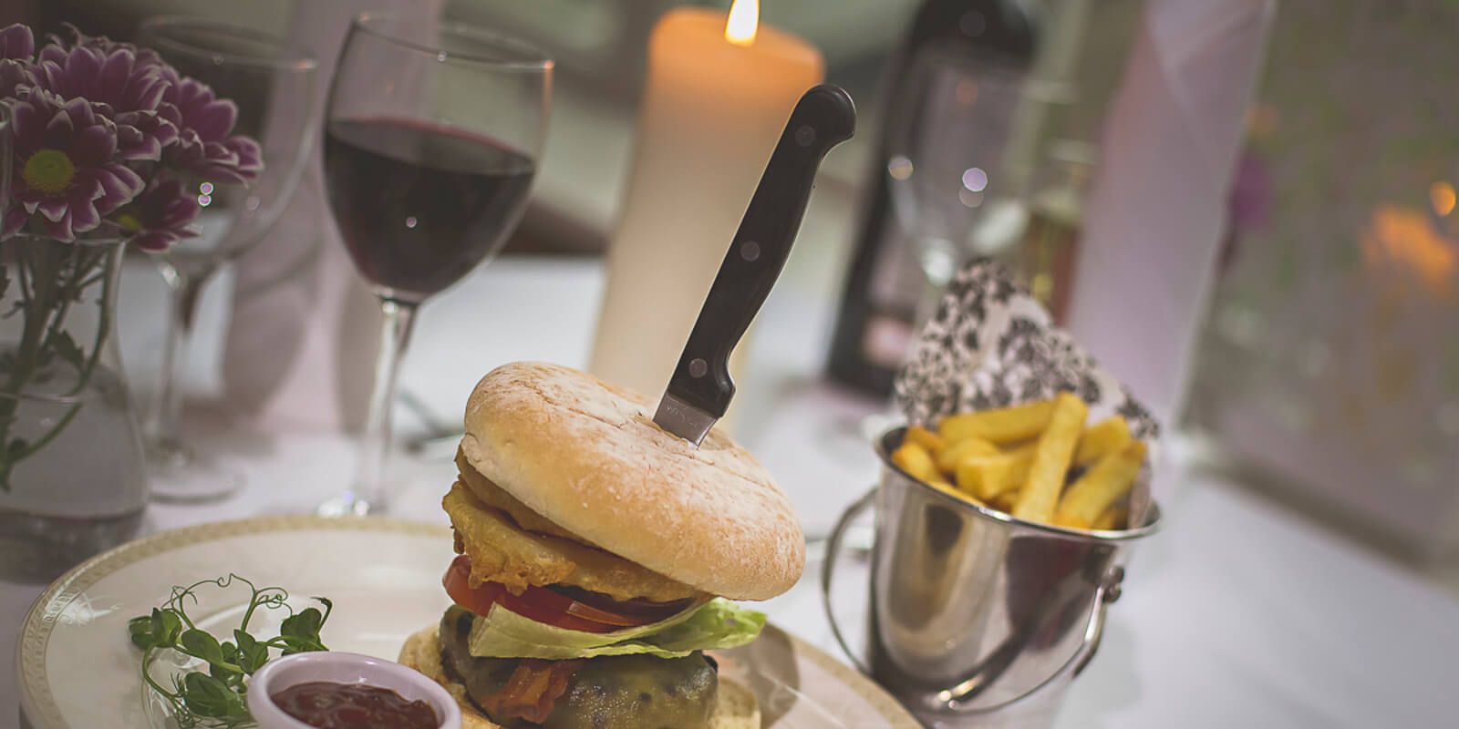 Abbey Tower Burger with Onion Rings and French Fries