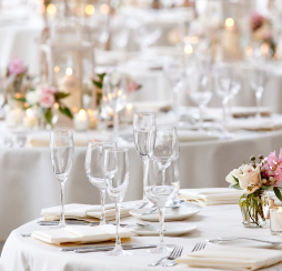 Dining tables decorated with floral arrangements
