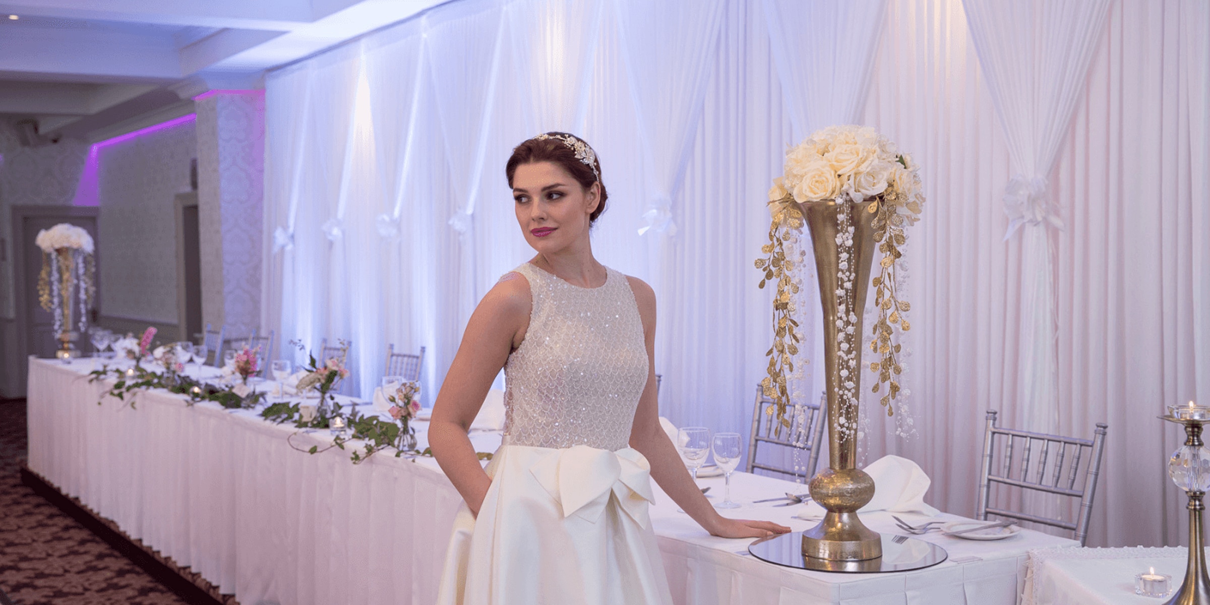 Bride standing in an elegant wedding reception