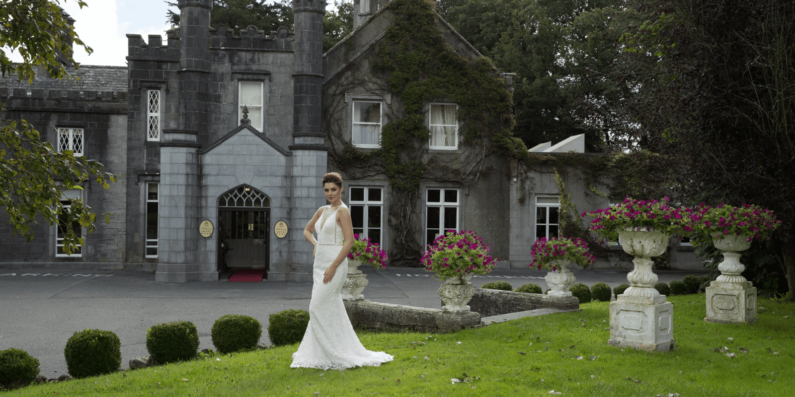 Bride standing outside the Abbey Hotel.